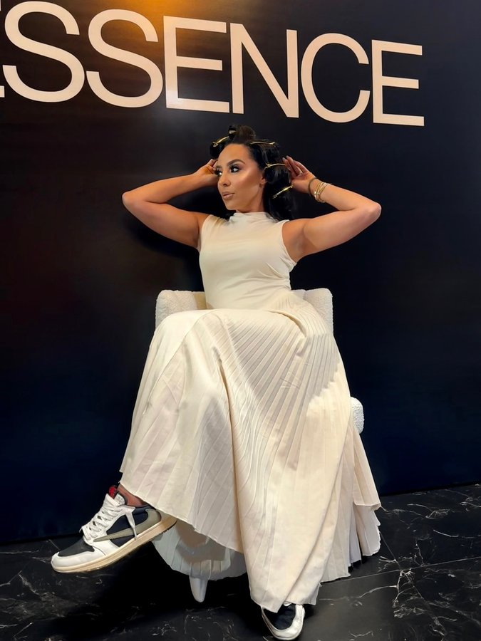 Instagram post by @doctoramira for ESSENCE. Caption reads: Our very ESSENCE is our superpower.

As women, we....