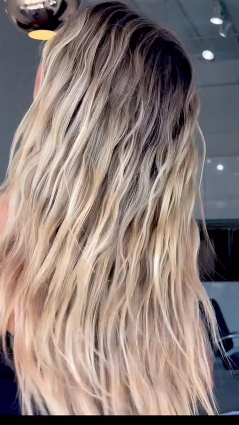 Instagram post by @lo_wheelerdavis for Donna Bella Hair. Caption reads: [...] my top go-to! I can always count on....