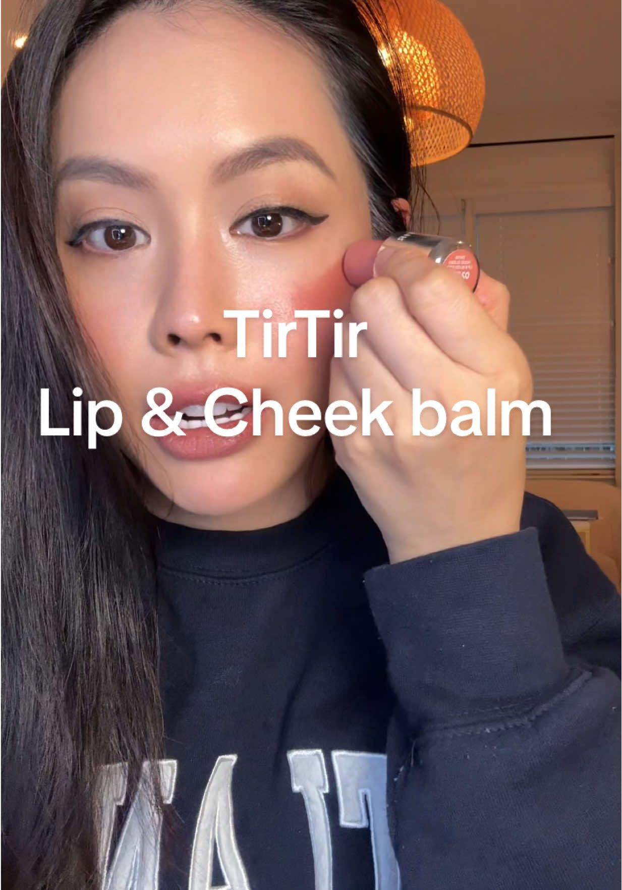 TikTok post by @lyndatran_ for TIRTIR. Caption reads: [...] your cheeks, eyes, and lips. @TIRTIR Inc.....