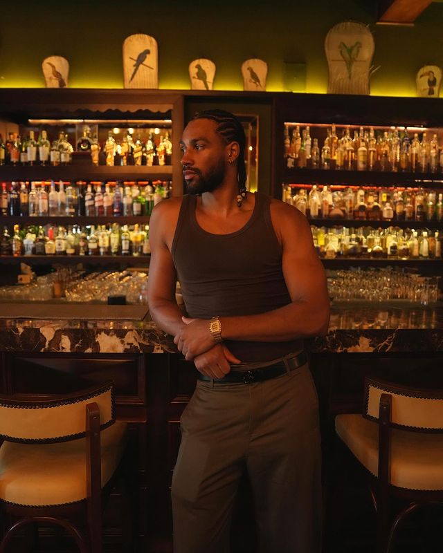 Instagram post by @deaven.booker for JBW. Caption reads: JBW Atlas. Face for face, timeless with taste🥂.