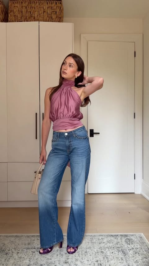 Instagram post by @cassiabaert for GUESS. Caption reads: The power of @guess denim. Wearing the Studded Mid....