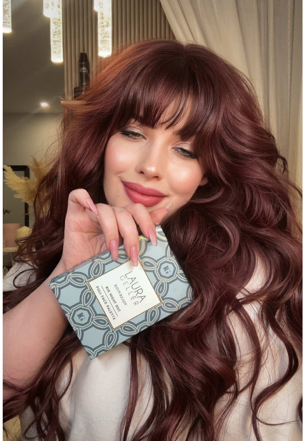 TikTok post by @thebeachwaver for – Laura Geller. Caption reads: Curls on point + a flawless glow? Yes, please 💖✨....