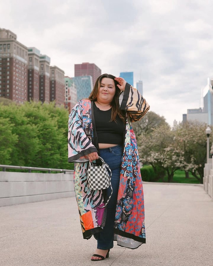 Instagram post by @natalieinthecity_ for Ashley Stewart. Caption reads: [...] casual plus size outfit slay from....