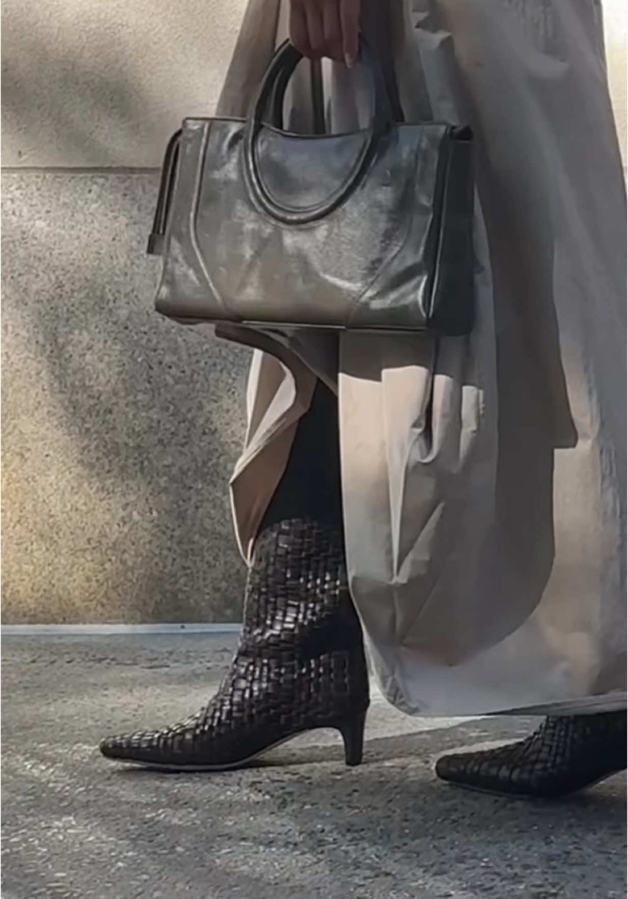 TikTok post by @sabinapaellmann for STAUD. Caption reads: Ready for boot weather with @STAUD 🍂.