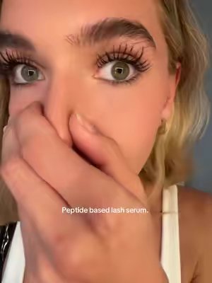 TikTok post by @thatgirlfinds101 for Nuorganic. Caption reads: Now my makeup ALWAYS eats. @nuorganic cosmic lash....
