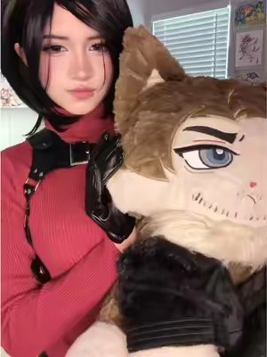 TikTok post by @sylvieecos for PlushShop. Caption reads: [...] ft Leon Kennedy plushieeee omggg!....