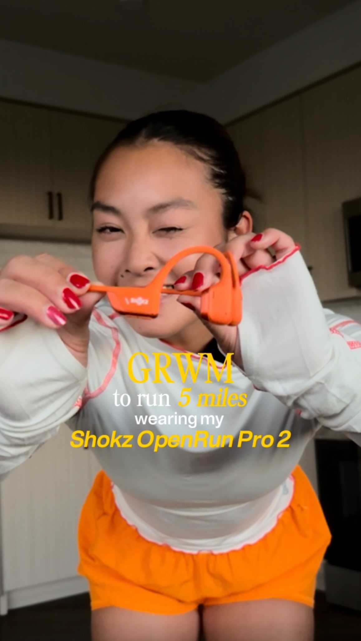 Instagram post by @just.jueit for Shokz. Caption reads: 3 outfits, one non-negotiable… My Shokz

My....