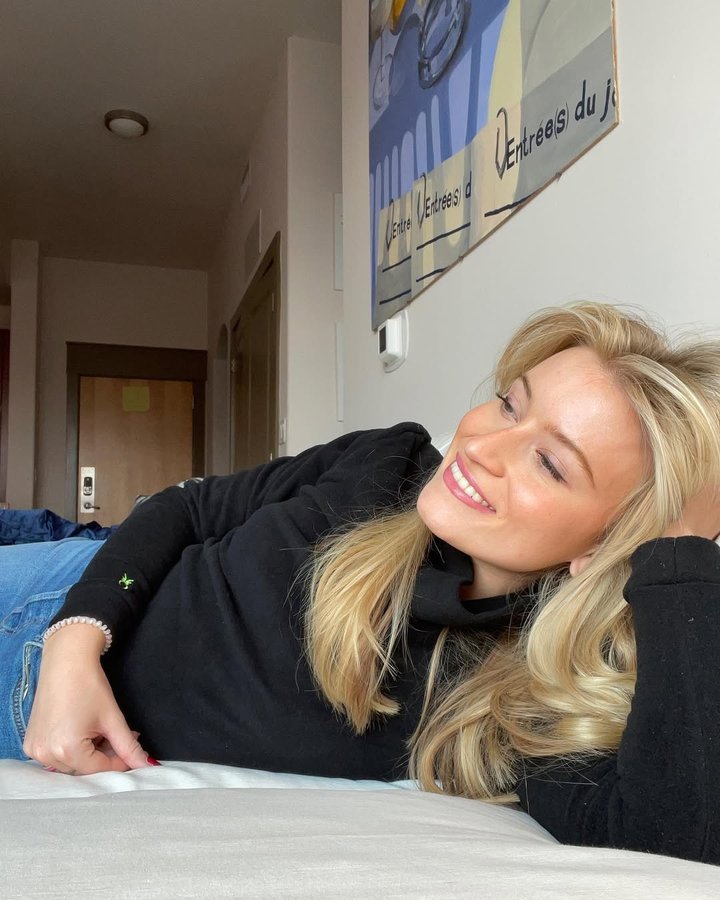 Instagram post by @quincyamorgan for Dudley Stephens. Caption reads: Me on my couch in @dudley_stephens Little Black....