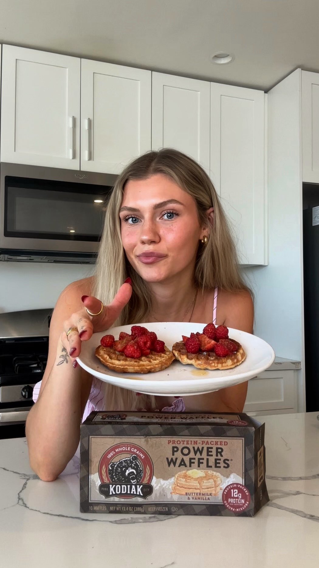 Instagram post by @itsbrookeelle for Kodiak Cakes. Caption reads: [...] his freezer stocked up with @kodiakcakes )....