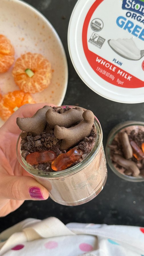 Instagram post by @yummytoddlerfood for Stonyfield Organic. Caption reads: #ad Quick and easy Dirt Cups for spooky season! 5....