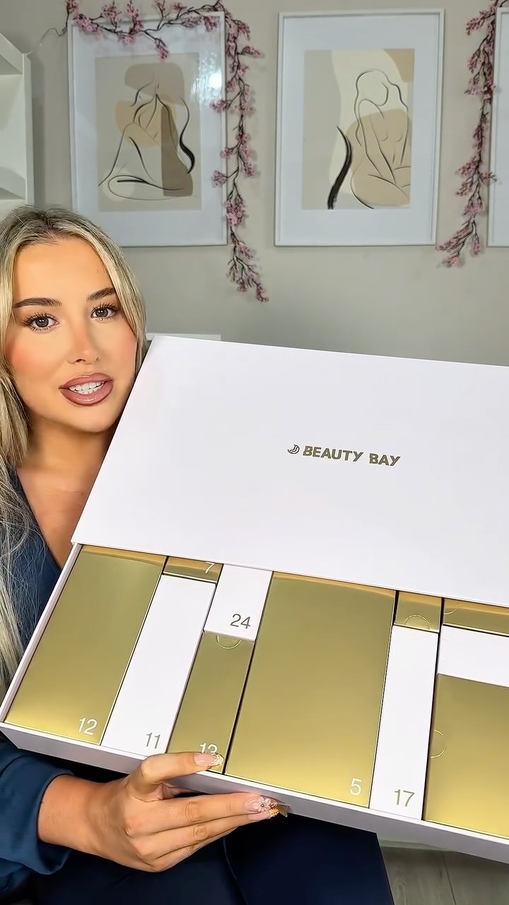 Instagram post by @alanajasminethomas for BEAUTY BAY. Caption reads: 2025 BEAUTY BAY advent calendar unboxing 🤭🎁

A....