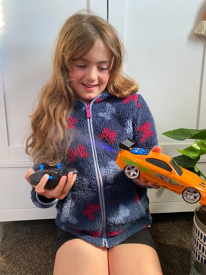 Instagram post by an influencer for Asda. Caption reads: [...] 1995 Toyota Supra is out NOW @asda PR....
