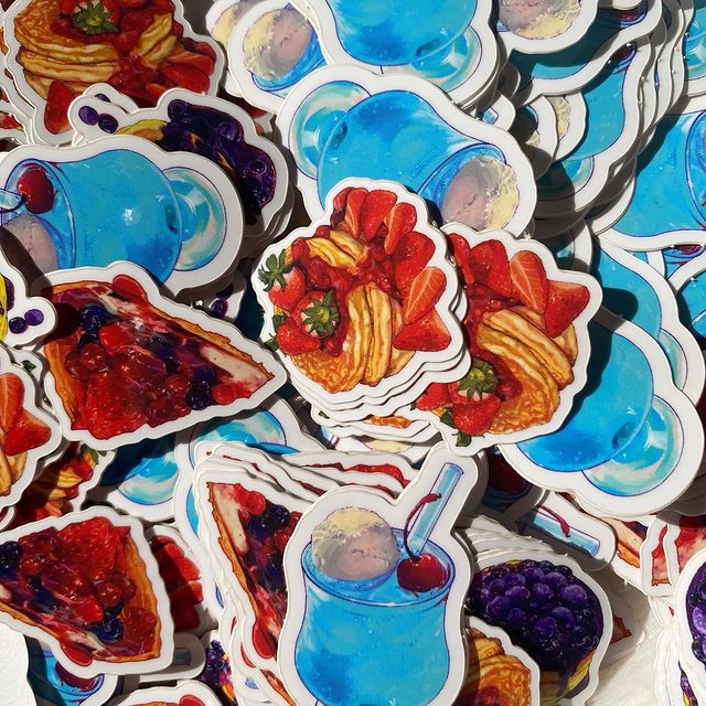 Instagram post by @miri__illust for StickerApp. Caption reads: StickerApp様とのコラボでステッカーを作成しました✨
めちゃくちゃ可愛く出来上がって大満足で....