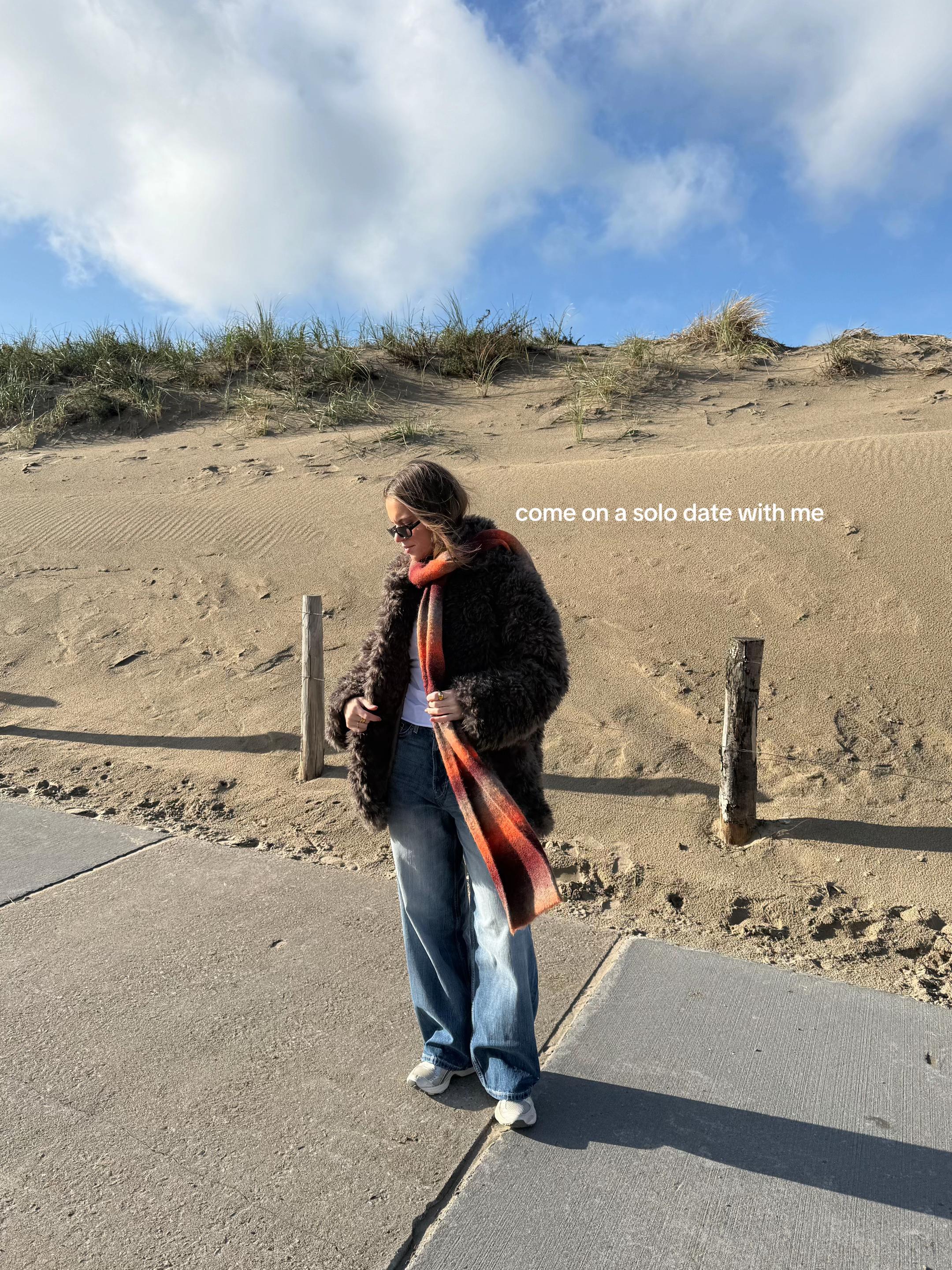 TikTok post by @emmivdburg for WEEKDAY. Caption reads: solo date with @Weekday 💌  Weekday have a Singles....