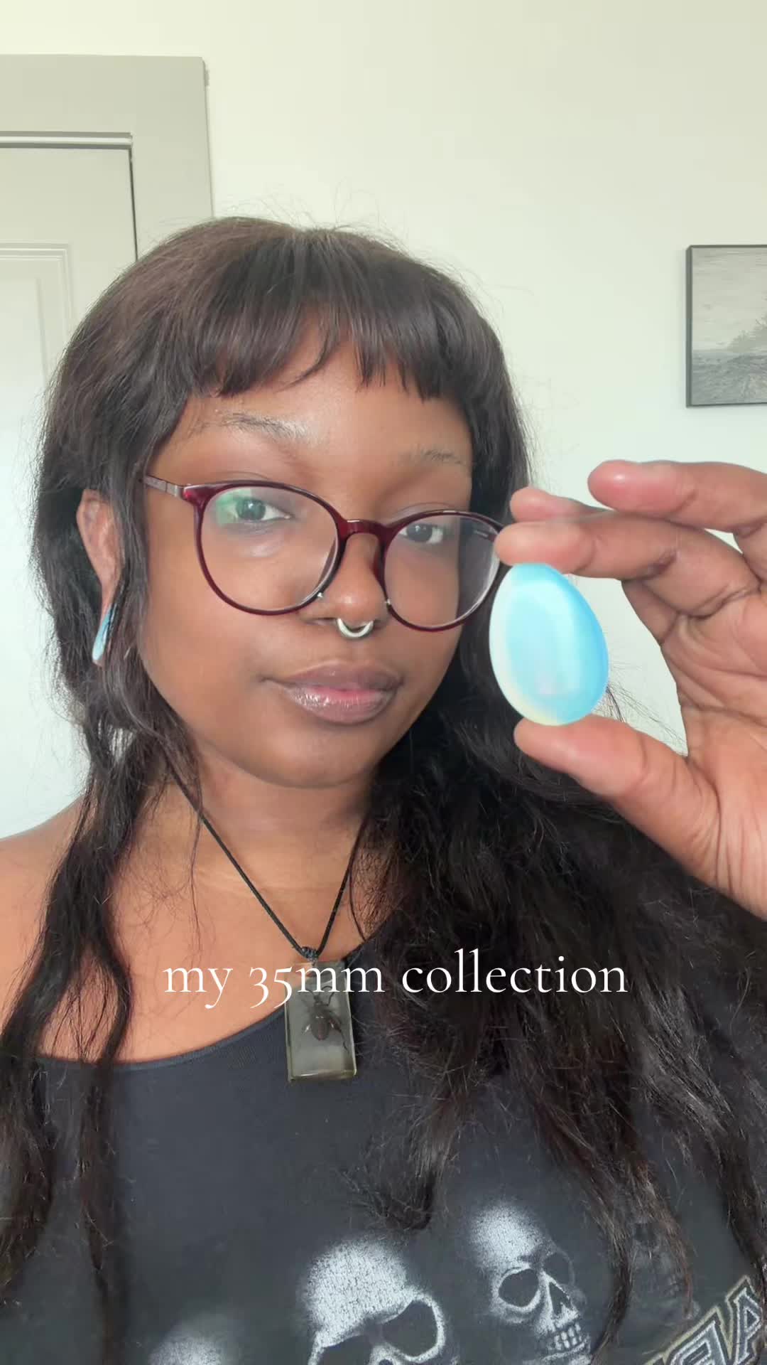 TikTok post by @girlfl3sh for Base Laboratories. Caption reads: [...] Ear stretching balm is from @Base....