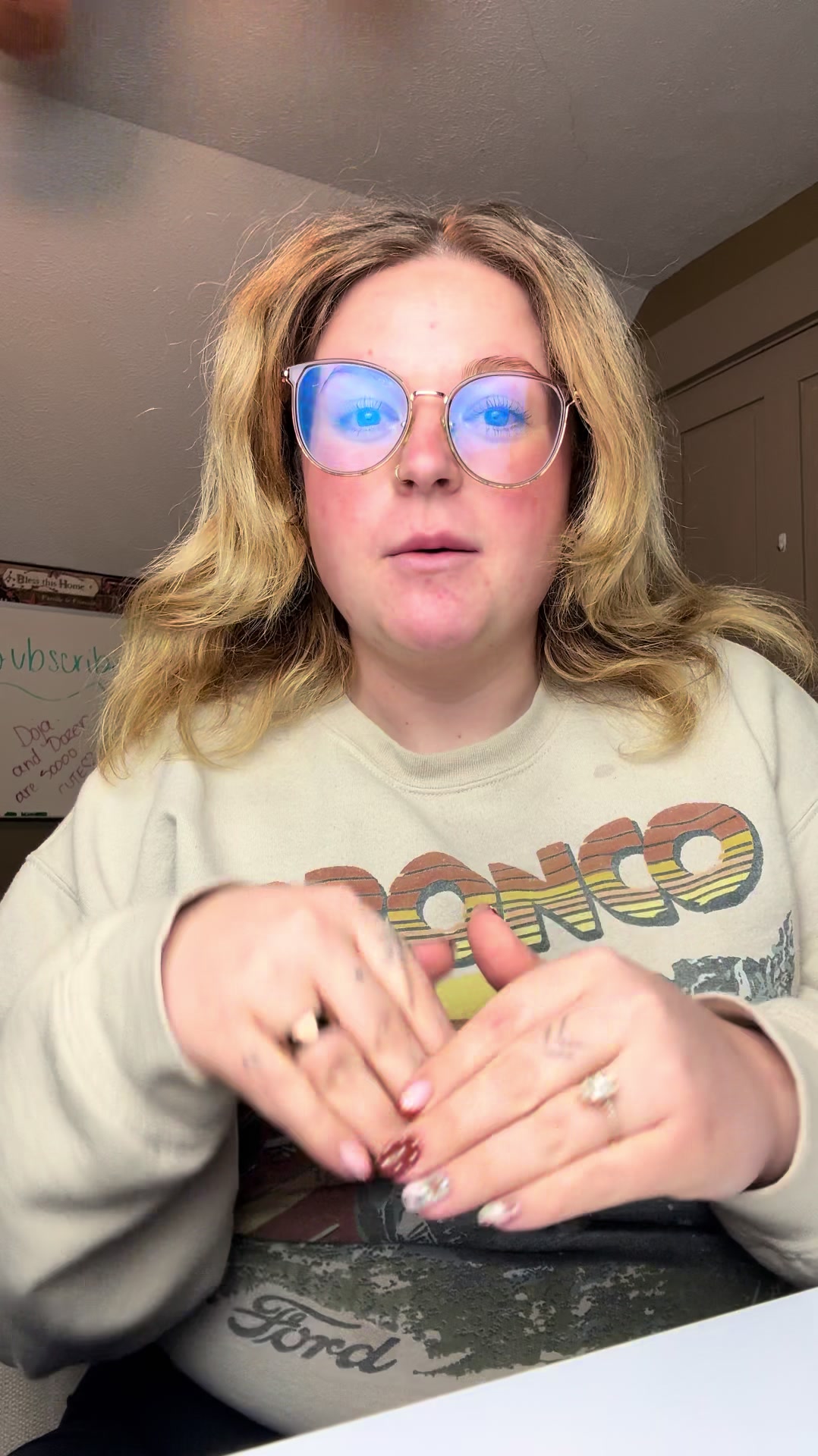 TikTok post by @laciemevans_ for Firmoo. Caption reads: Where do I get my glasses?! @Firmoo Glasses .