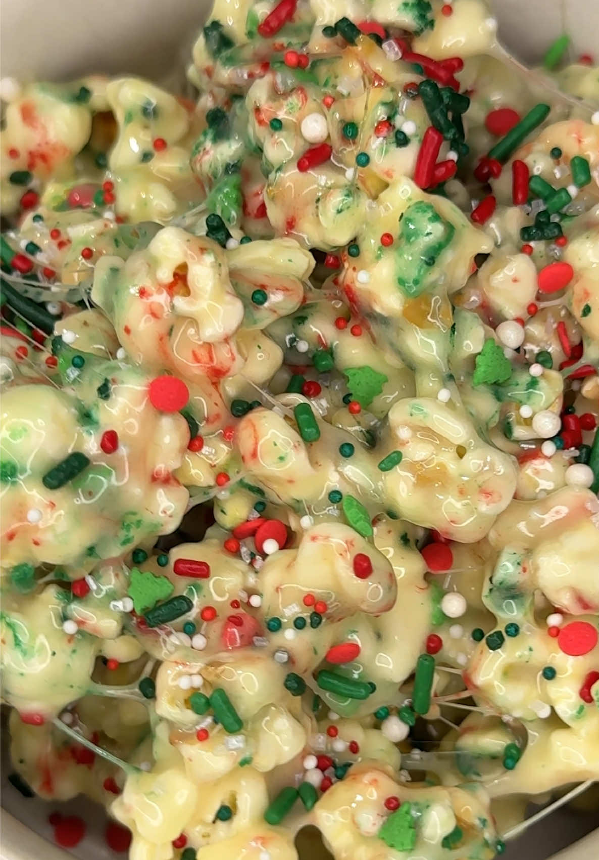 TikTok post by @ashleymarkletreats for Betty Crocker. Caption reads: the viral sugar cookie marshmallow popcorn needs....