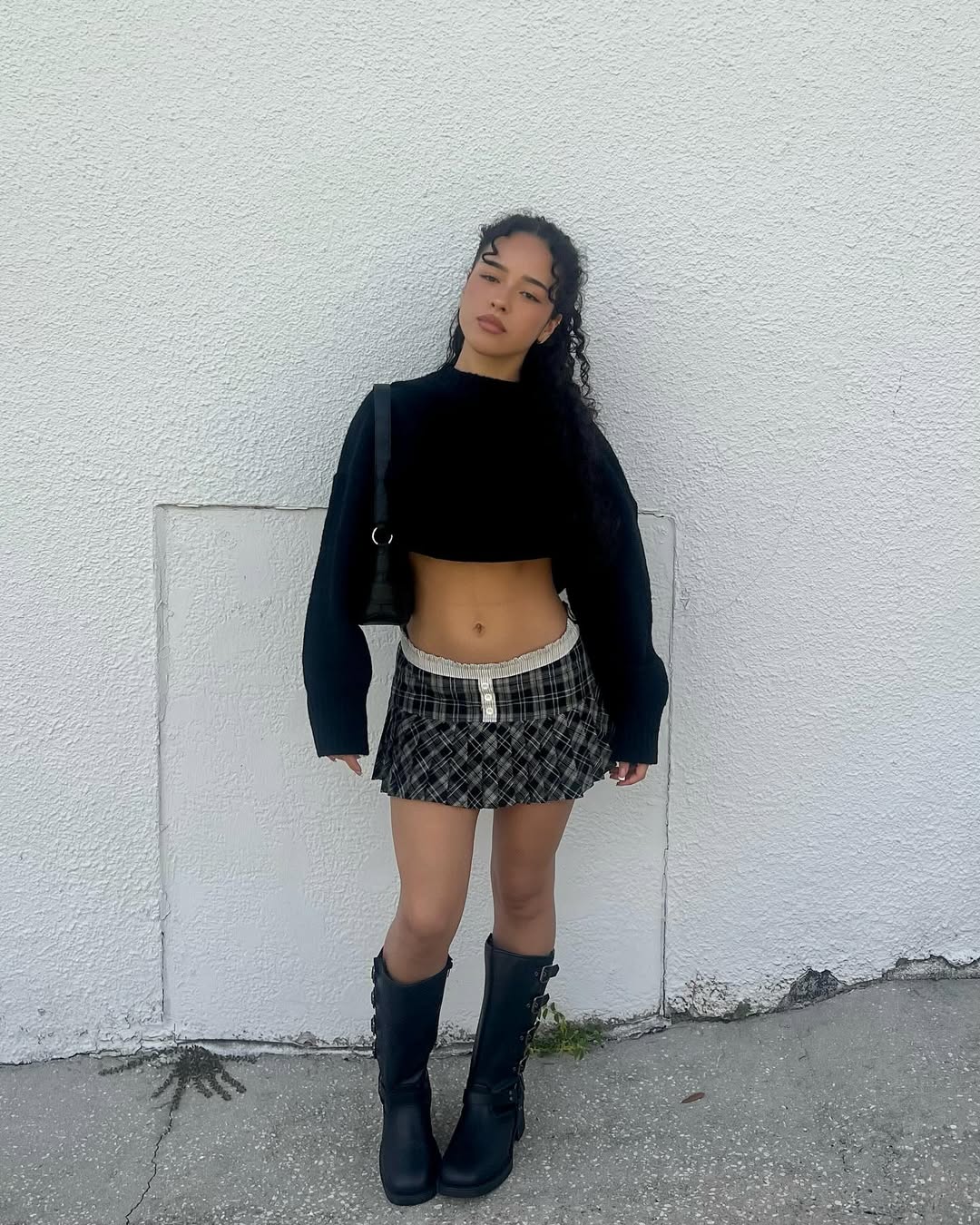 Instagram post by @raimireyes for Fashion Nova. Caption reads: rockstar princess⛓️‍💥 stomping around in....