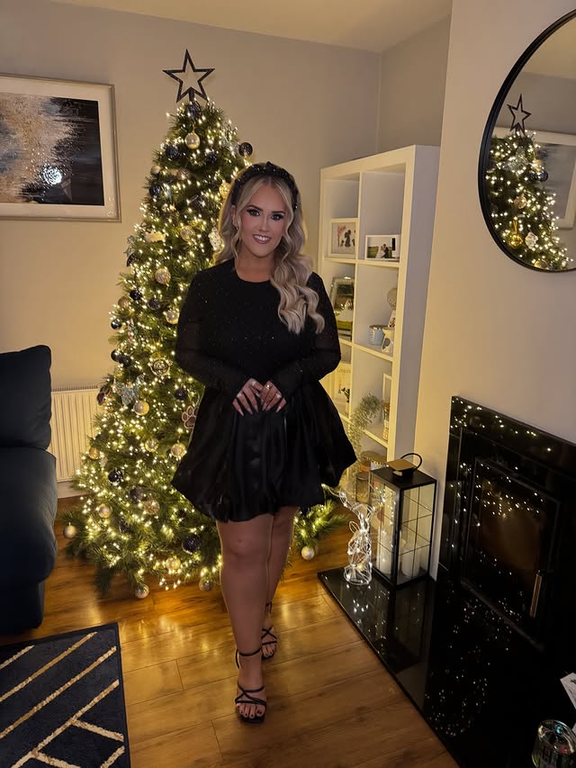 Instagram post by @amylouisehayde_mua for Vavavoom. Caption reads: Silly season 🎄🤶🏼🎁🖤✨ 
Dress @vavavoom_ie....