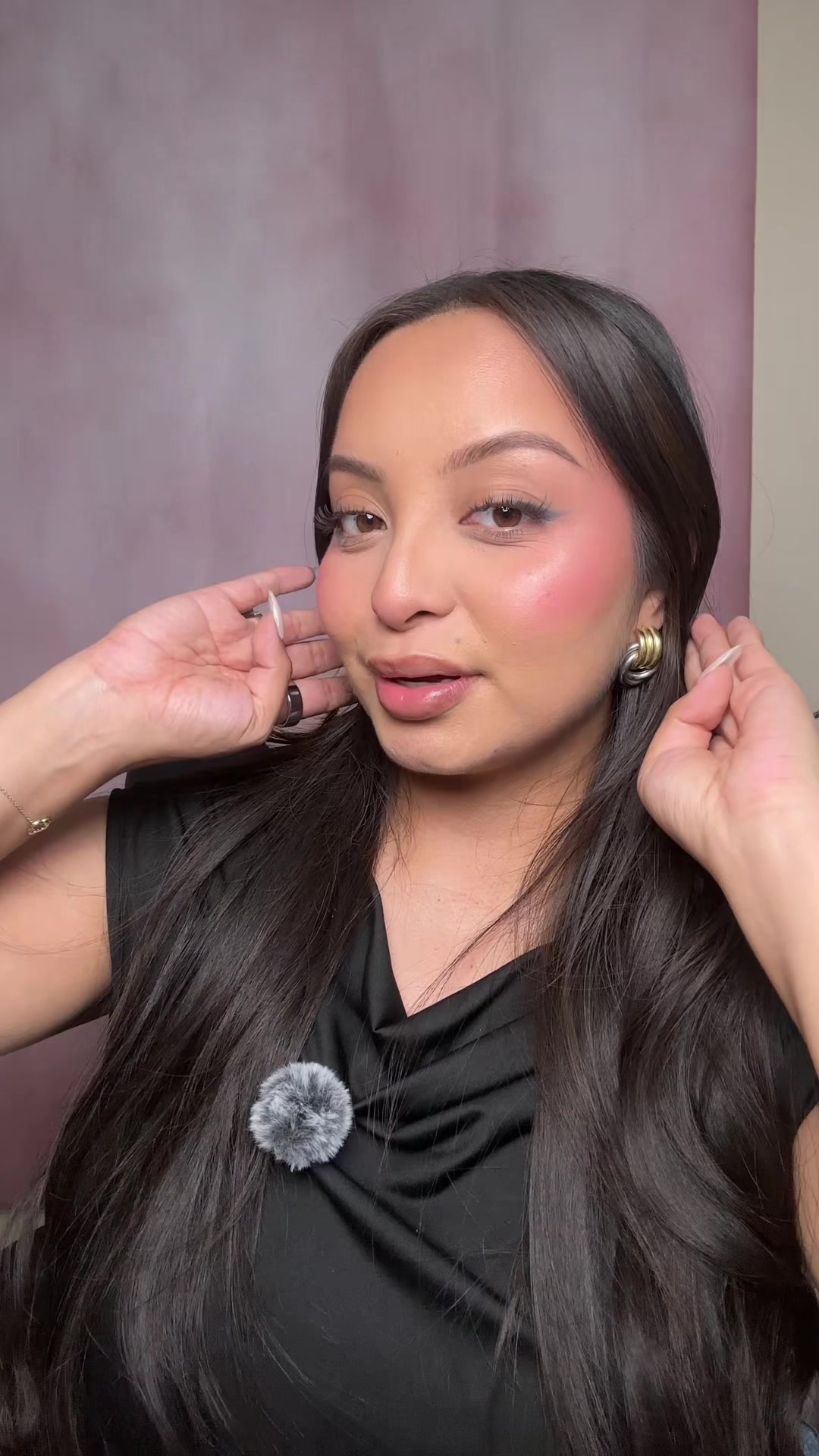 TikTok post by @lilianaa.sanchezz for Evian Facial Spray USA. Caption reads: Retouching my makeup after wearing it for hours ✨....