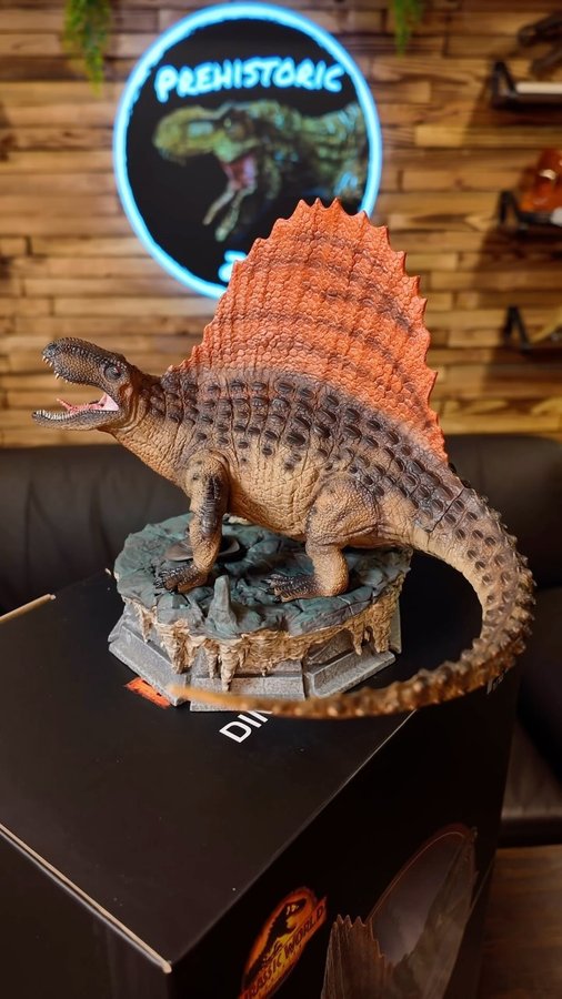 Instagram post by @prehistoriczone for Iron Studios. Caption reads: Unboxing the new @ironstudios Jurassic World....