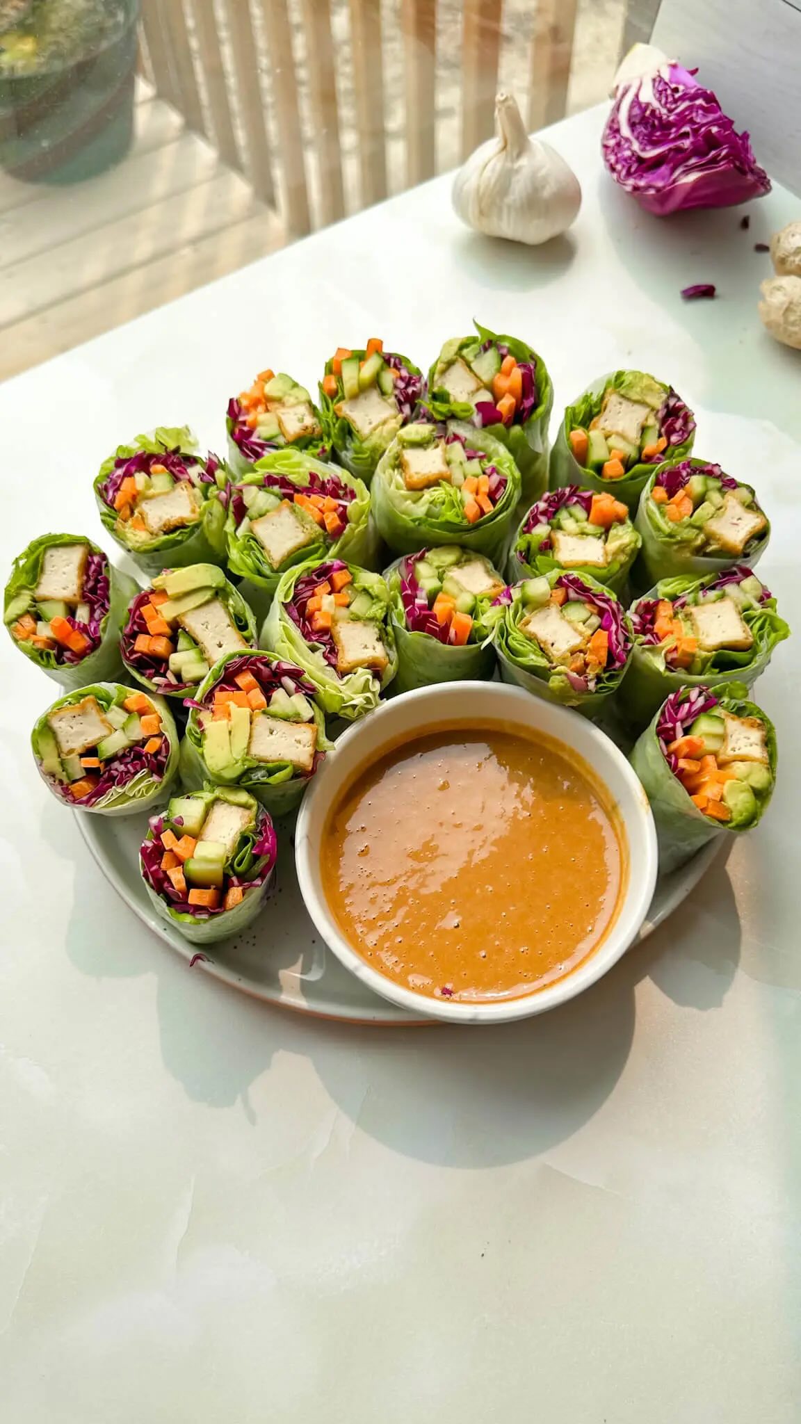 Instagram post by @that.veganbabe for PBfit. Caption reads: The Ultimate Summer Lunch! 😍☀️

Summer Rolls with....