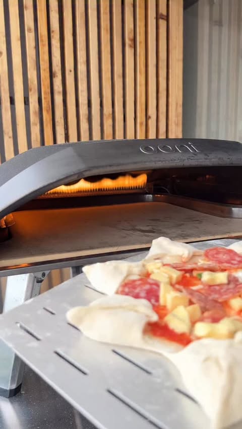 Instagram post by @7thfloorpizza for Ooni. Caption reads: Baking the star pizza in the Ooni Koda 16.....