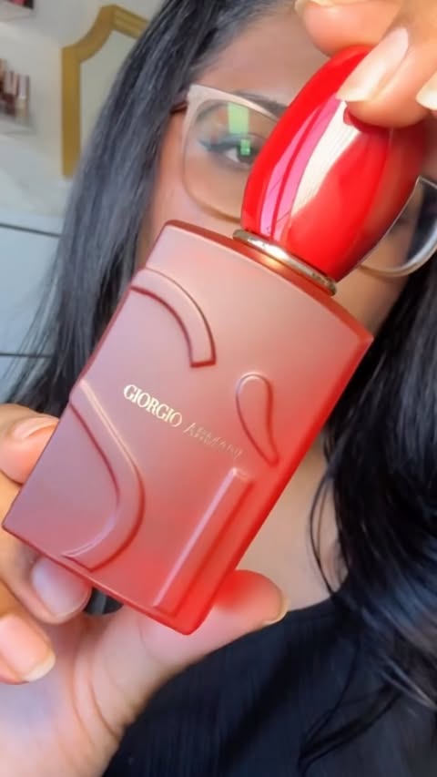 Instagram post by an influencer for Armani beauty. Caption reads: [...] you tried this one yet? 👇 @armanibeauty....