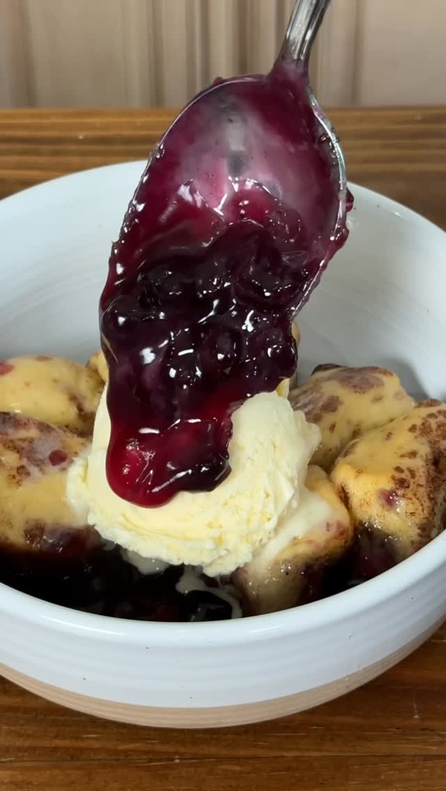 Instagram post by @ninjacue for Pit Boss Grills. Caption reads: 3 ingredient blueberry cinnamon roll cobbler....