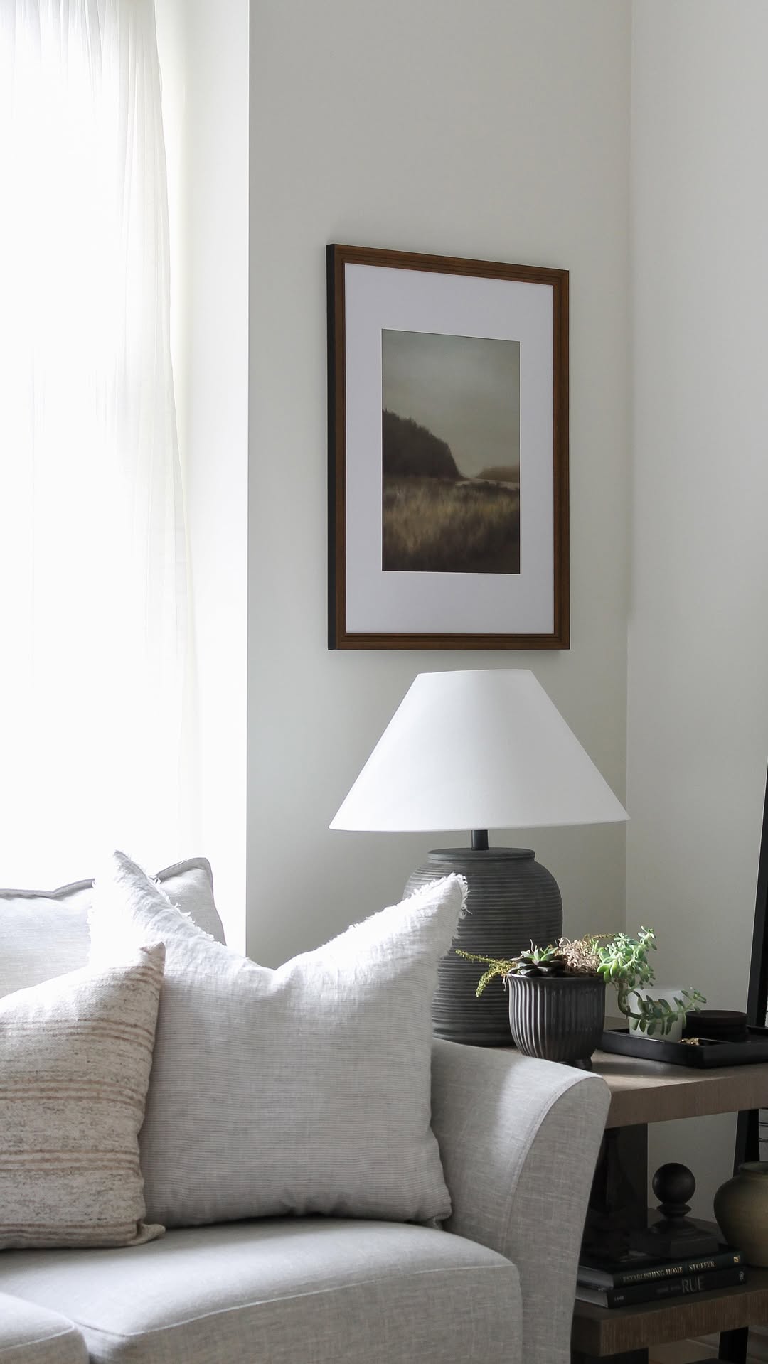 Instagram post by @dinasdigs for Opposite Wall. Caption reads: One of the easiest ways to update a space is with....