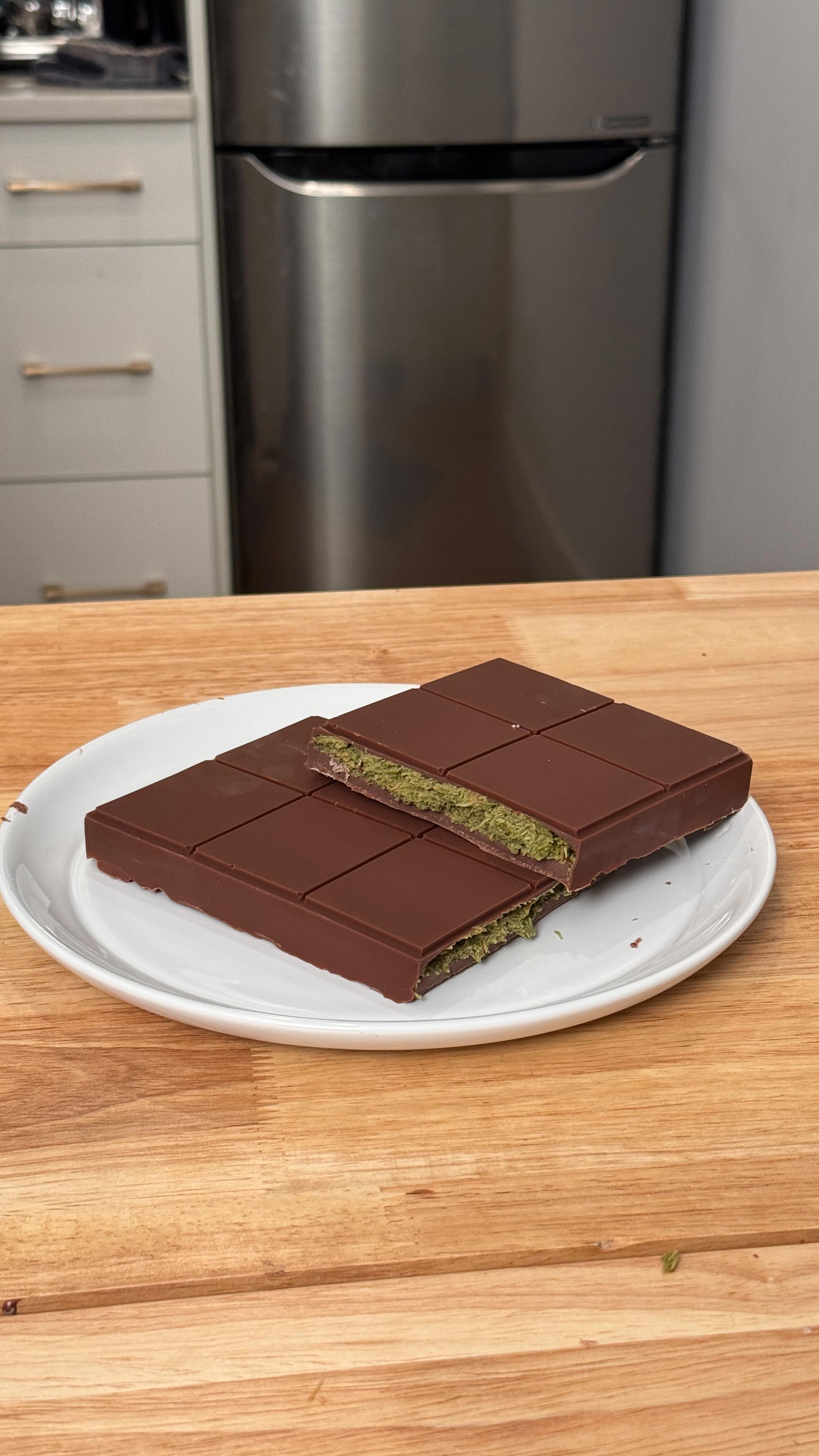 Instagram post by @al.chenny for Hersheyland. Caption reads: #ad Made a Dubai-inspired chocolate bar with a....