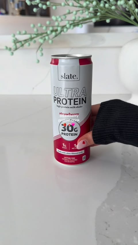 Instagram post by @ets_.nene for Slate Milk. Caption reads: [...] drink🍓 🥤🩷 #slatepartner @target....