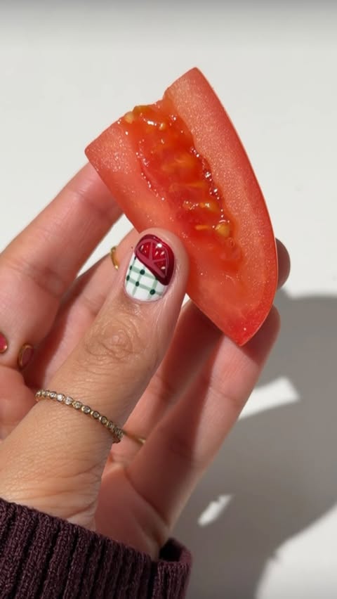 Instagram post by @nonnailartist for essie. Caption reads: [...] I managed to cram on my short nails 🤭....
