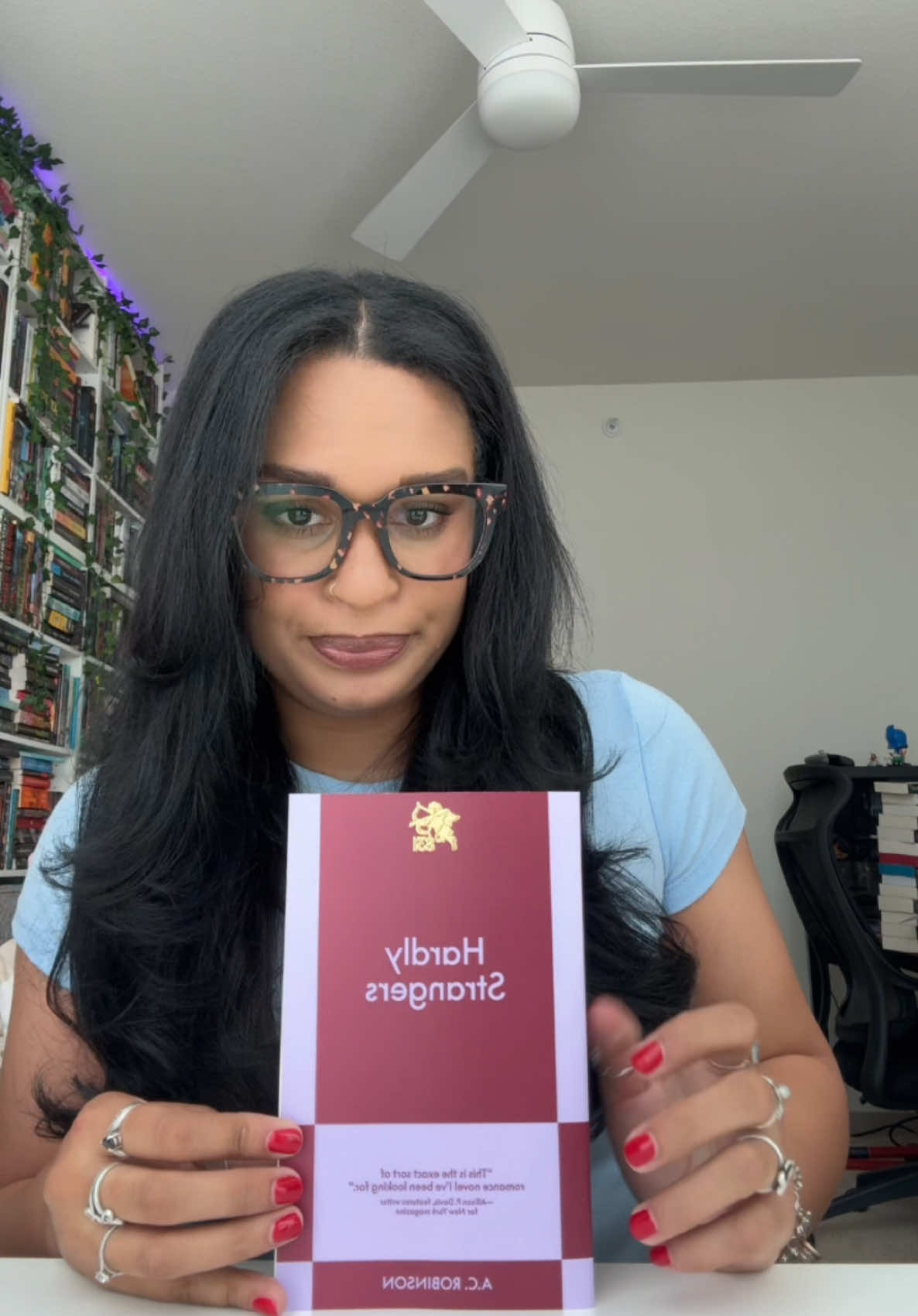 TikTok post by @jolie_reads for 831 Stories. Caption reads: [...] #HardlyStrangers #ACRobinson #831stories....