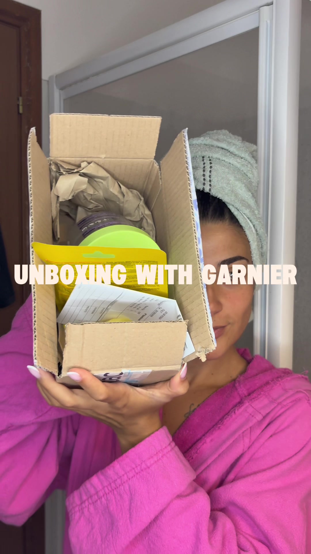TikTok post by @mafy_ugc for garnieritalia. Caption reads: unboxing with @garnieritalia #productsentby....