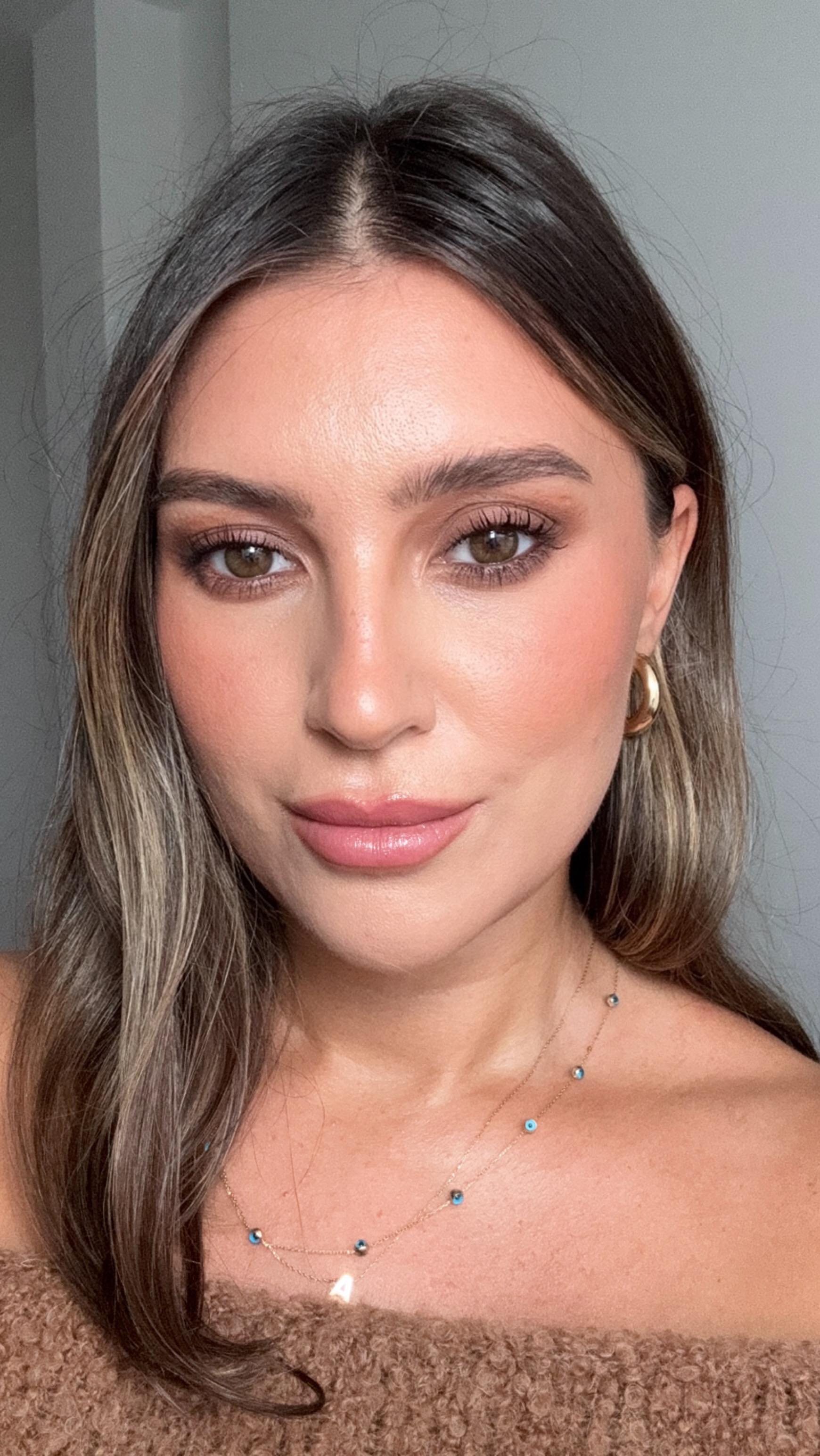 Instagram post by @selcanguerel for Givenchy Beauty. Caption reads: Bronzy look✨ Who can tell what‘s different about....