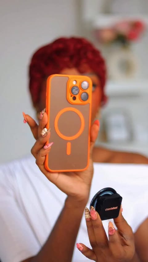 Instagram post by @maglen_oyana for Huda Beauty. Caption reads: phone grip & powder in one 😱💕 @hudabeauty....