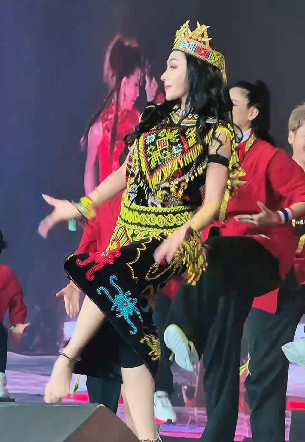 TikTok post by @denadaindonesia for Zumba. Caption reads: The Beauty of Borneo 🪶💚✨ • Tahun ini aku memakai....