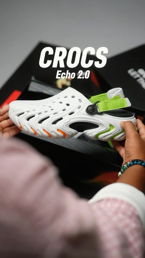 Instagram post by @theshoeunboxer for Crocs. Caption reads: Crocs really said comfort, but make it [...].