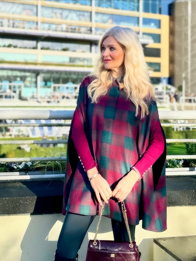 Instagram post by an influencer for Holland Cooper. Caption reads: [...] 🐨 Outfit Details: Cape....