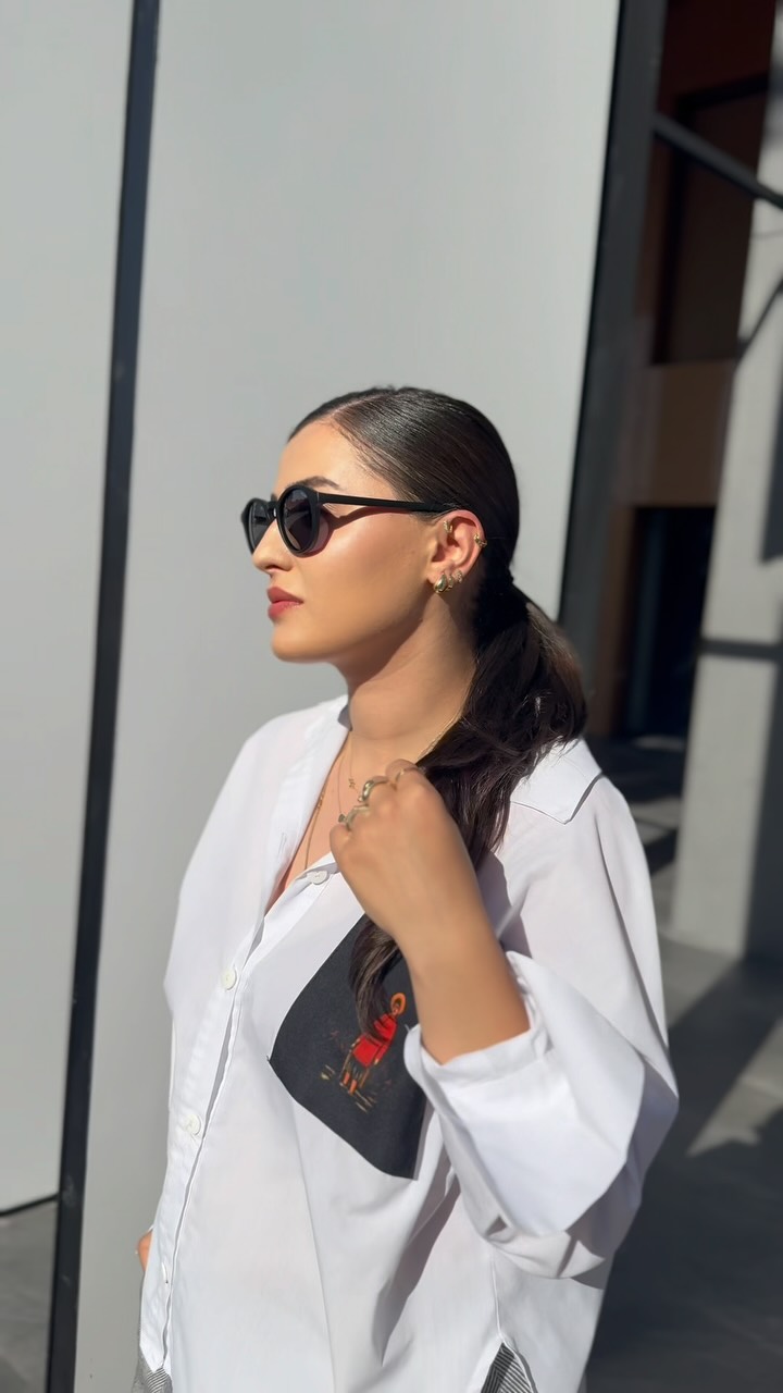 Instagram post by @ninucabesadze for SOJOS VISION. Caption reads: Sunglasses from @sojosvision , Eco-friendly,....