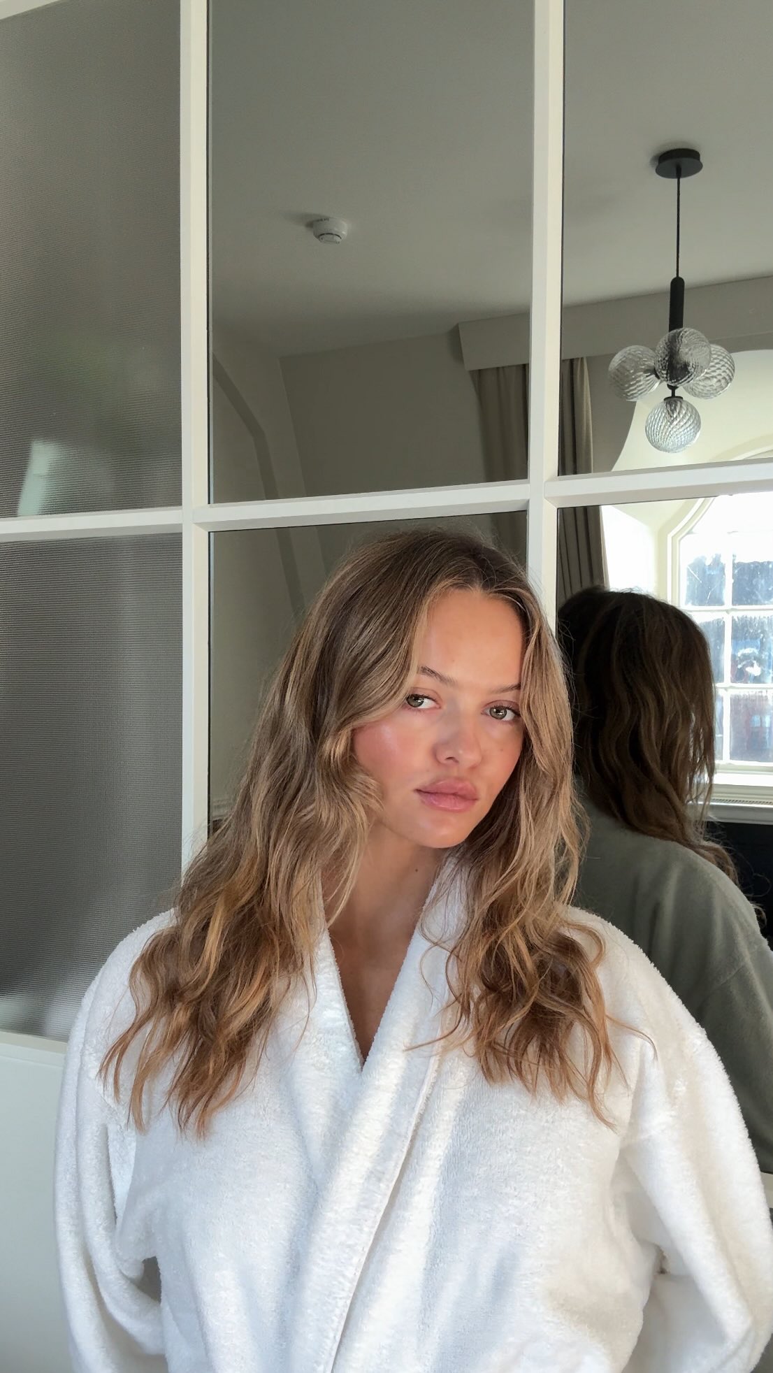 Instagram post by @pariswycherley for Nude by Nature. Caption reads: Checked into the House of Nude @nudebynature....