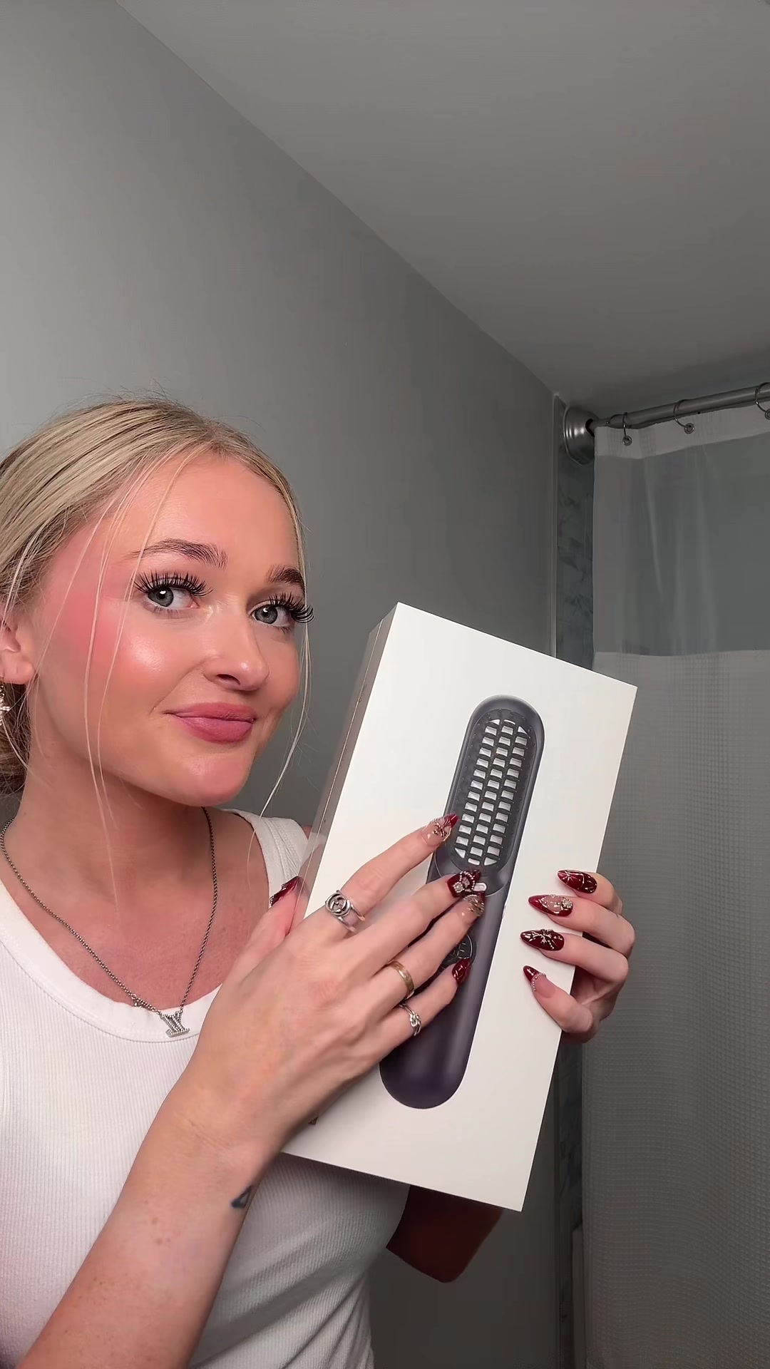 TikTok post by @jessy_koller for Fanttik. Caption reads: [...] Frizz-fighting. Game-changer. @Fanttik ....