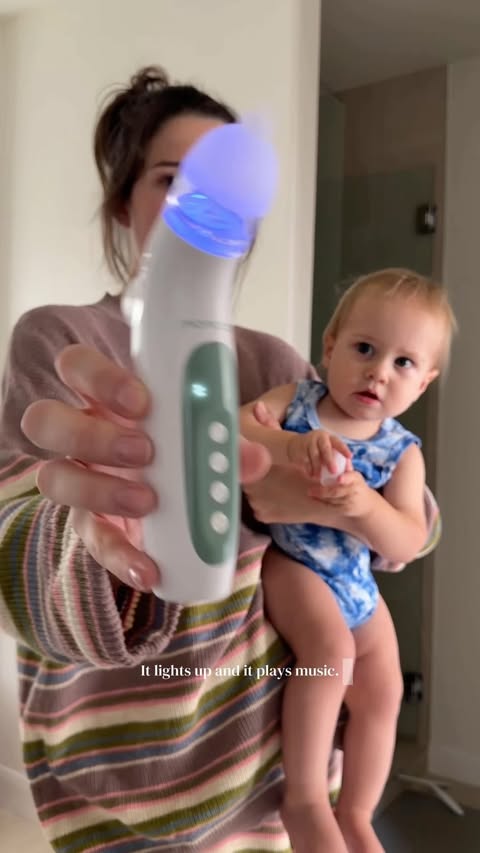 Instagram post by @gwynyth for Momcozy. Caption reads: This Momcozy nasal aspirator is a mom must have!....