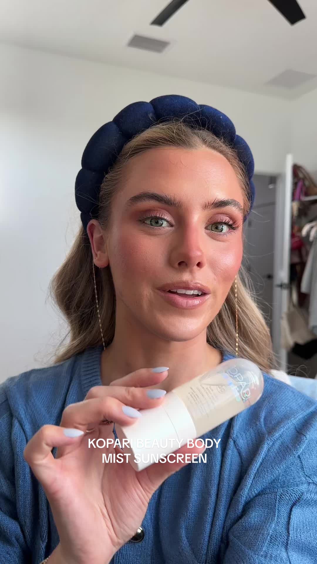 TikTok post by @sloanevosen for Kopari Beauty. Caption reads: the new SPF fragrance spray @Kopari Beauty is the....