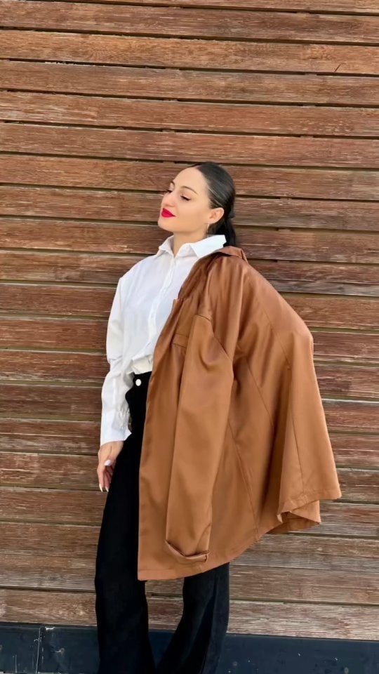 Instagram post by @teona.kurtanidze for LightInTheBox. Caption reads: Fall season is officially here 🍂
Stay cozy and....