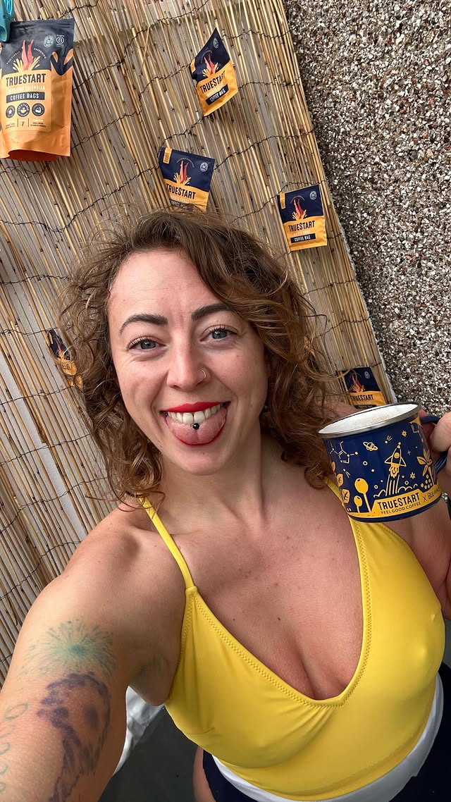 Instagram post by @michaela_in_the_wild for TrueStart Coffee. Caption reads: [...] trying to get over hump day? Let....