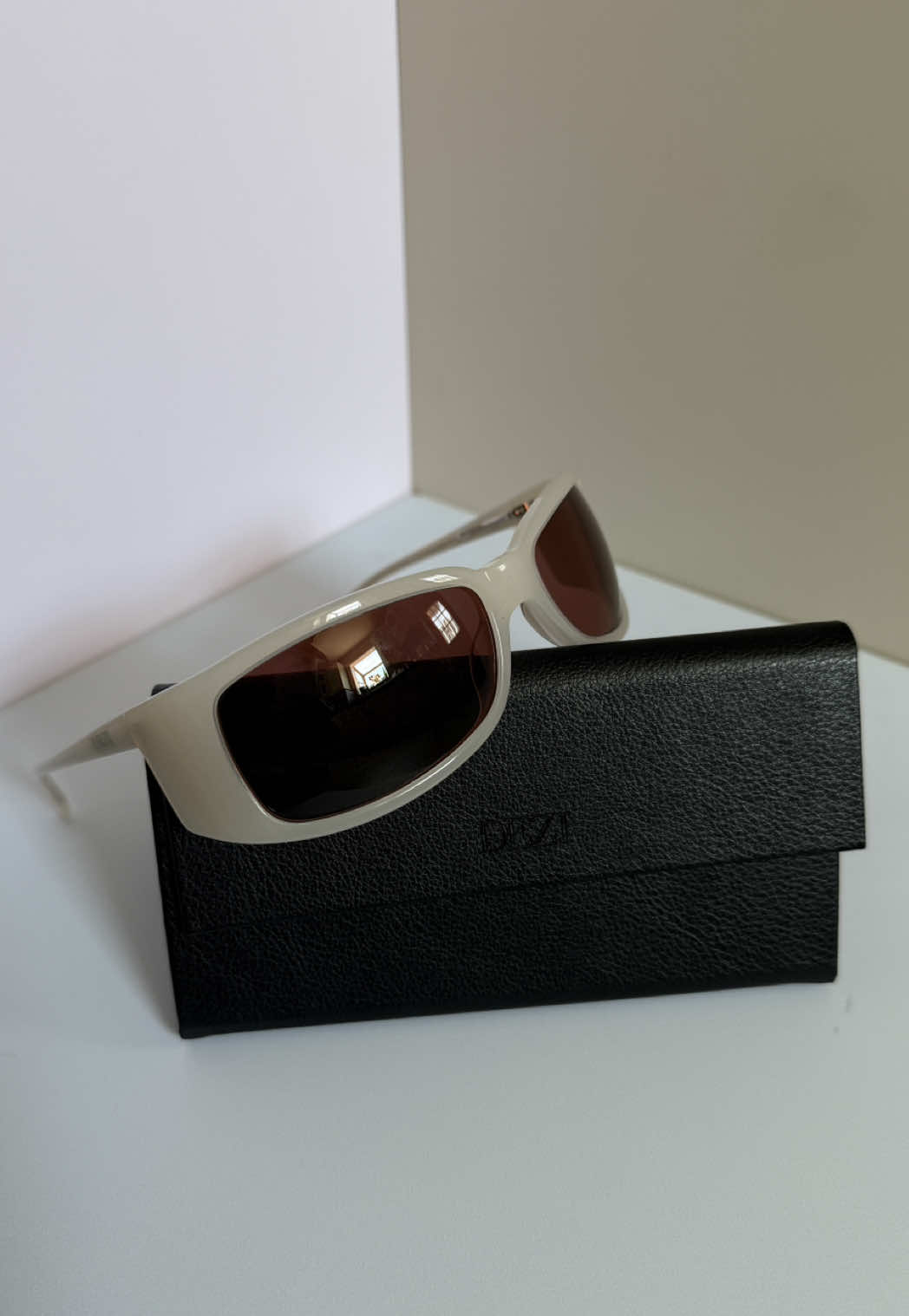 TikTok post by @brendalalatina for DEZI. Caption reads: All I think about is money & @DEZI EYEWEAR sunnies....