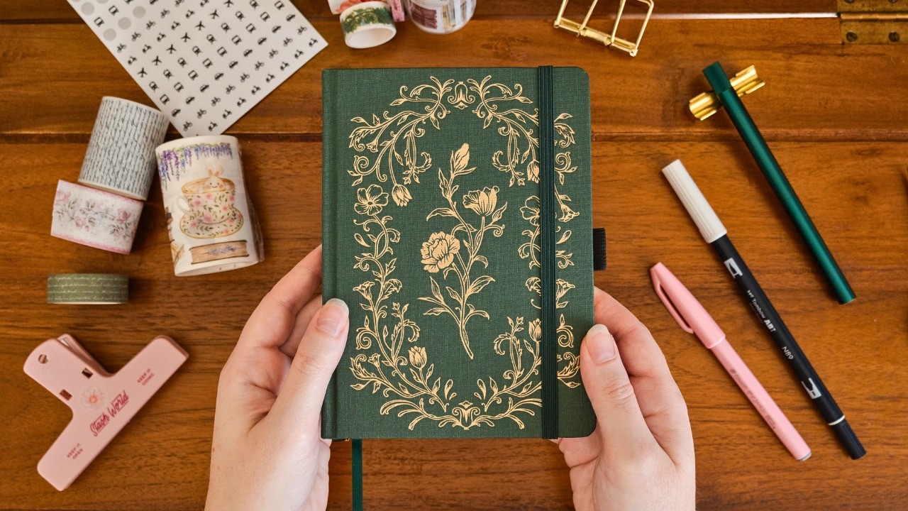 YouTube post by @ErinSmith for – Stationery Pal. Caption reads: A Fresh Travel Journal for a New Adventure.