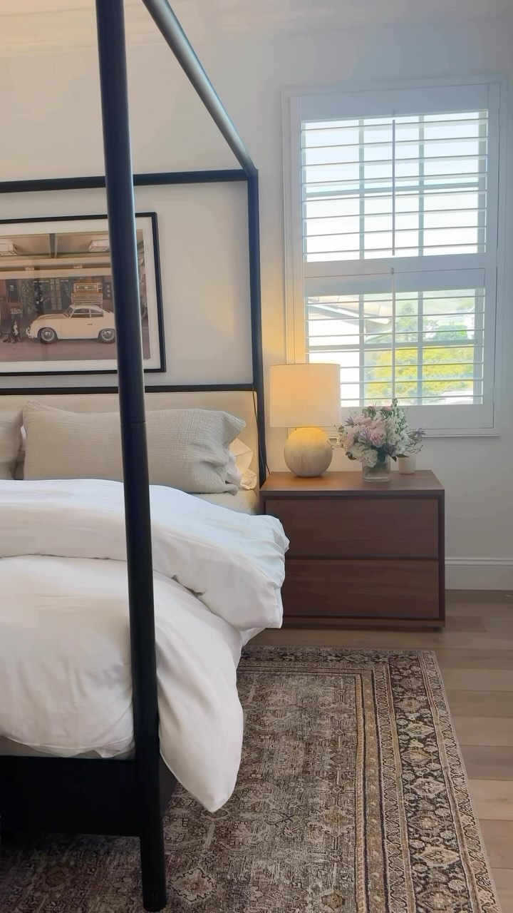 Instagram post by @amanda_stantonn for Brooklinen. Caption reads: spring bedroom refresh 💐 what a difference a few....